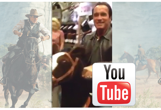 Arnold Schwarzenegger on a toy horse